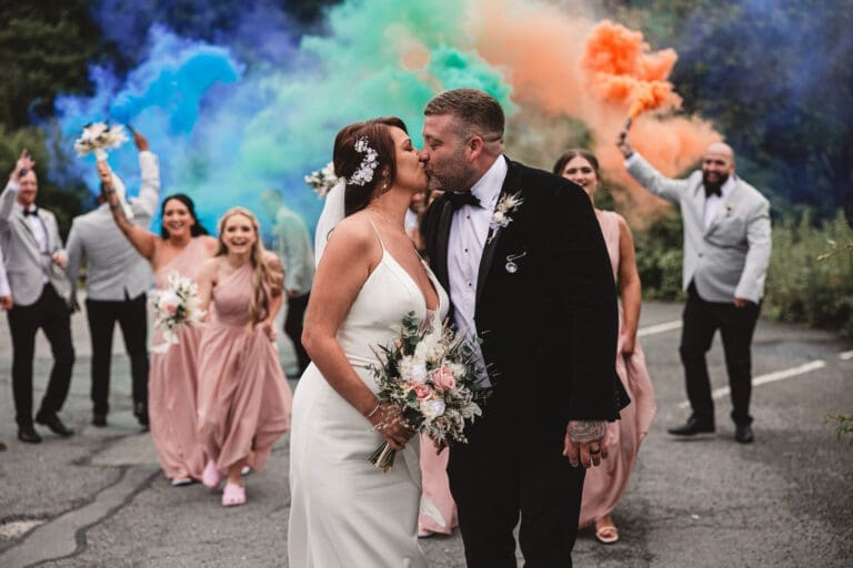 Colourful smoke bombs at the venue bowers mill inn Halifax | Halifax Wedding Photographer