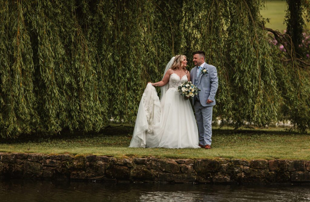 Bride and groom on island at rudding park hotel