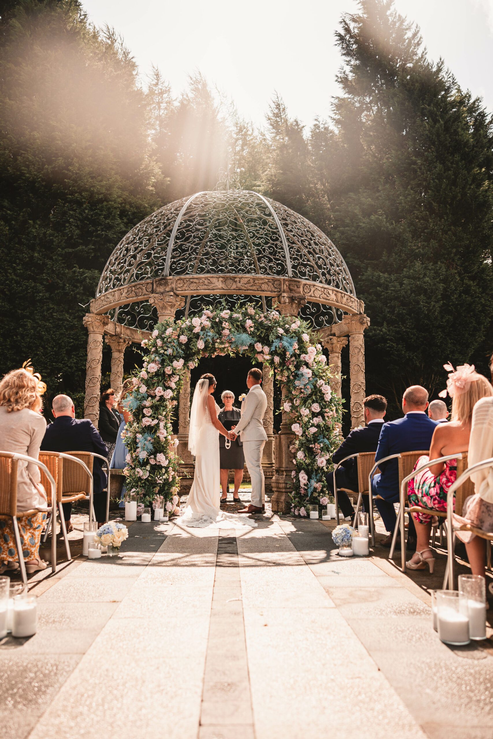 Sun shining on couple as the getting married at saddlworth hotel for the outdoor ceremony | West Yorkshire Wedding photographer