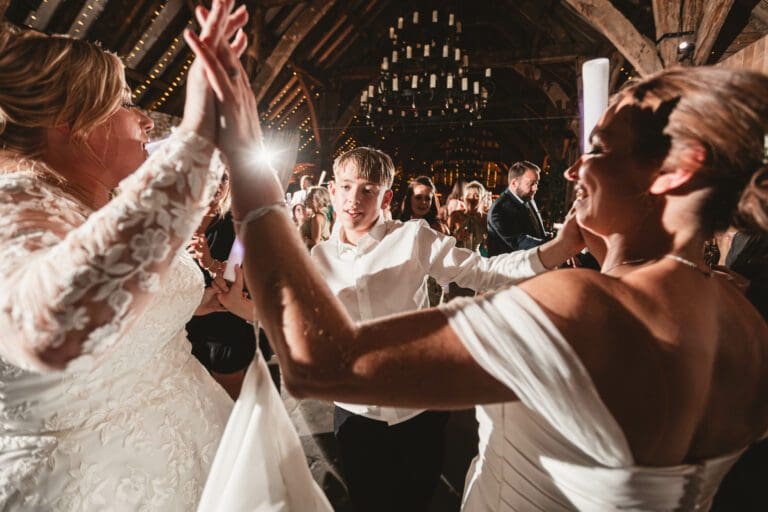 guests dancing at the tithe barn