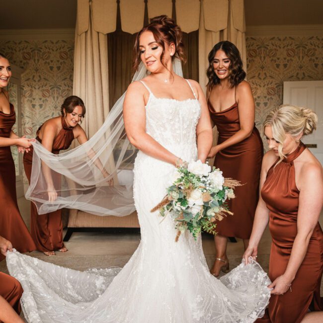 Bride getting ready with her bridesmaids at hodstock priory | Yorkshire Wedding Photographer