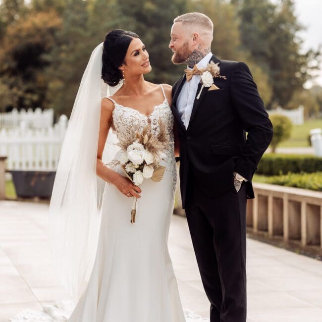 west yorkshire wedding photographer taking photos of bride and groom at crow wood hotel