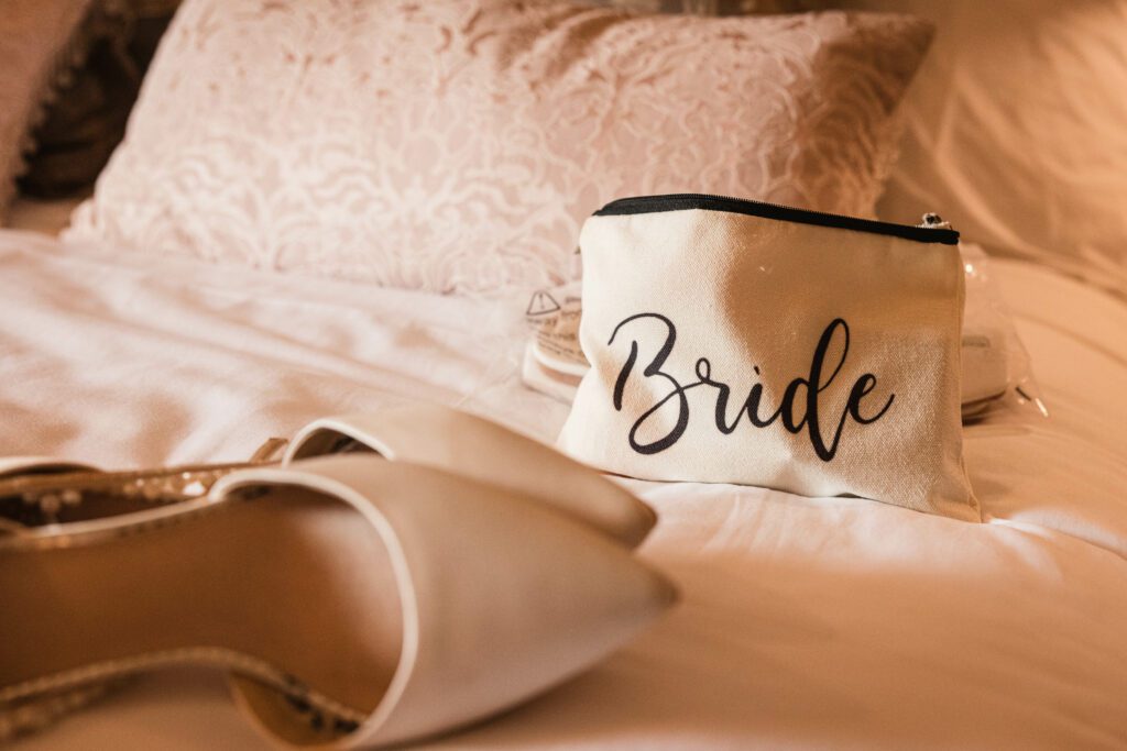 bridesmiads shoes on the bed with a bride bag in the background at carlton towers | West yorkshire wedding photography