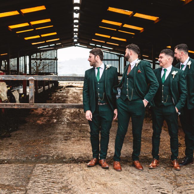 boys at the bashall barn outside the cow shed looking inside